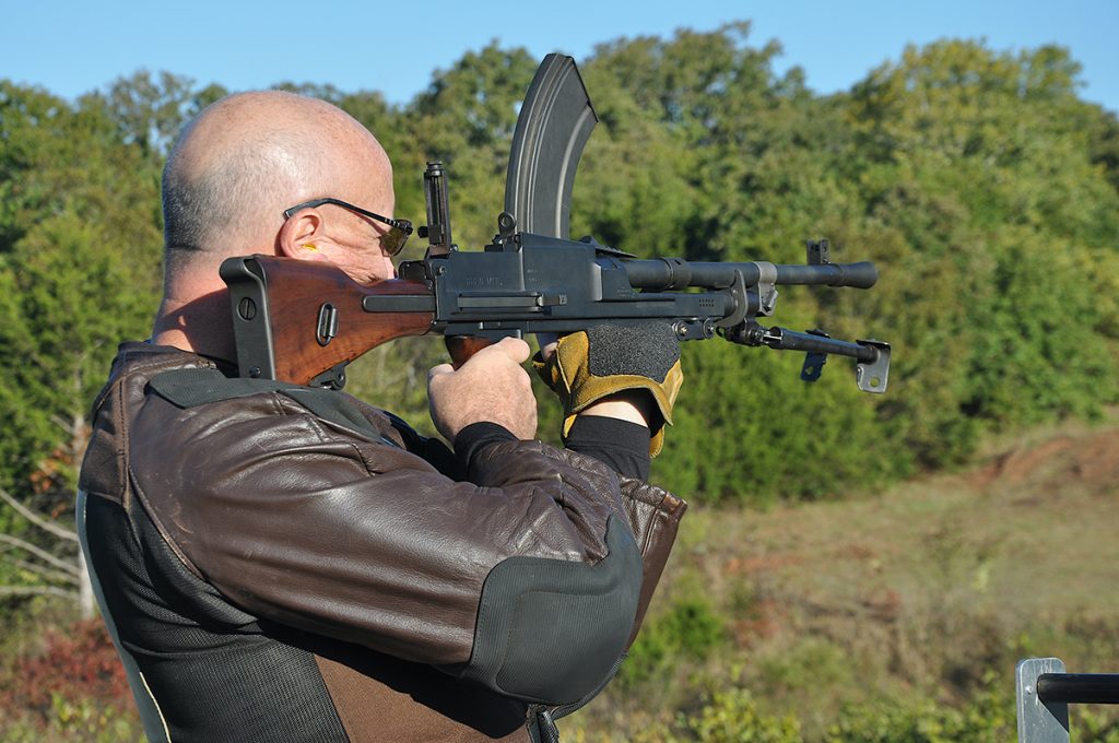 Gere Goodenberger fired a Bren light machine gun, loading a single round after each shot.