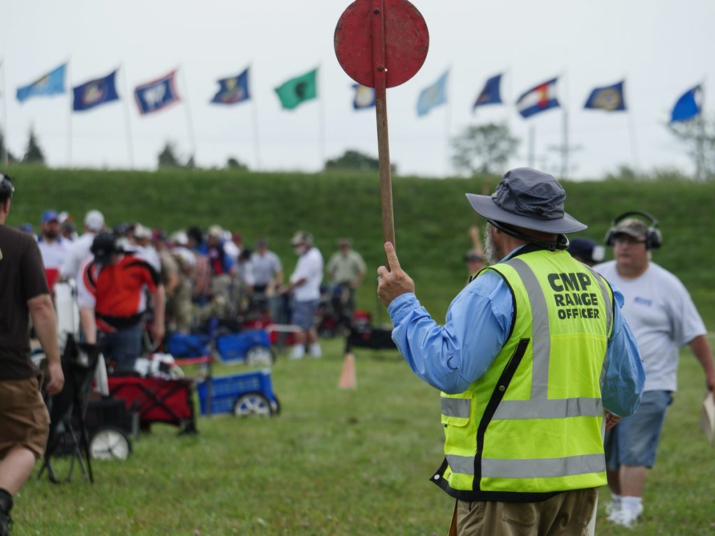 CMP Range Officer signaling the line is not ready.