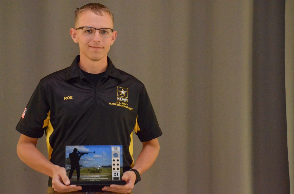 Spc Roe poses with his award from the National Smallbore Matches at Camp Perry.