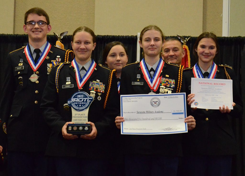 Sarasota Military Academy with trophy and national record