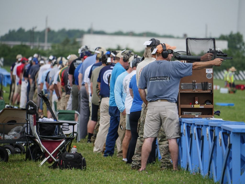 Pistol shooters on firing line at Camp Perry