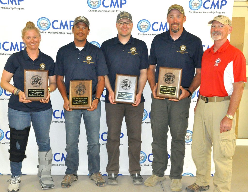 Team CMP Gold posing with award plaques