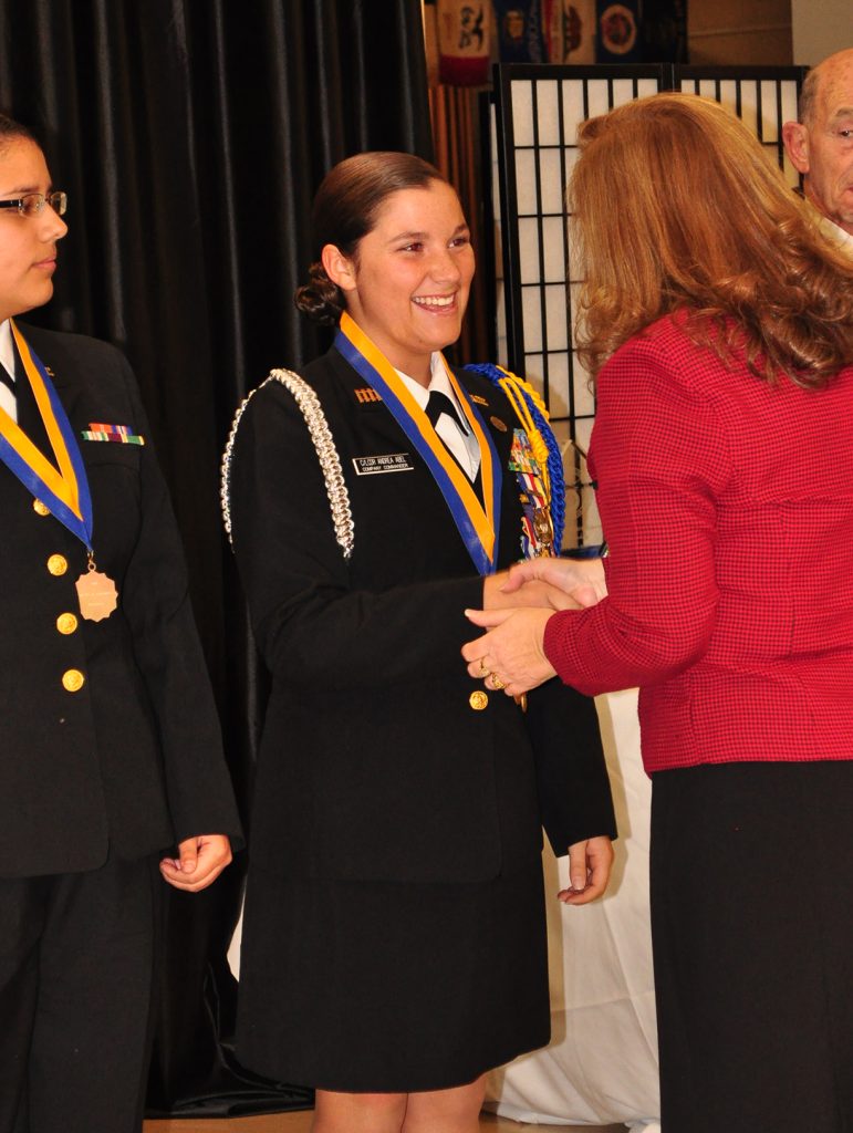 Teresa presenting award to junior cadet