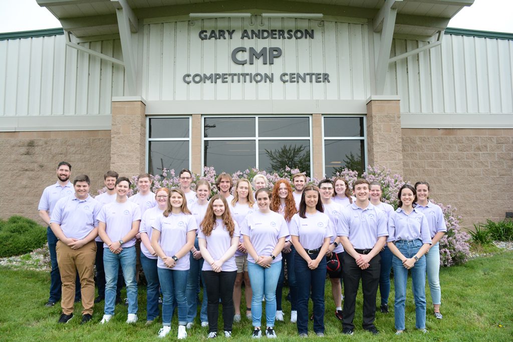 The 2022 Summer Camp counselors and staff standing outside the Gary Anderson Competition Center.