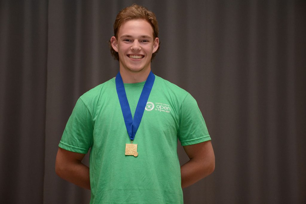 Logan earned a medal for leading the juniors in the three-position smallbore competition