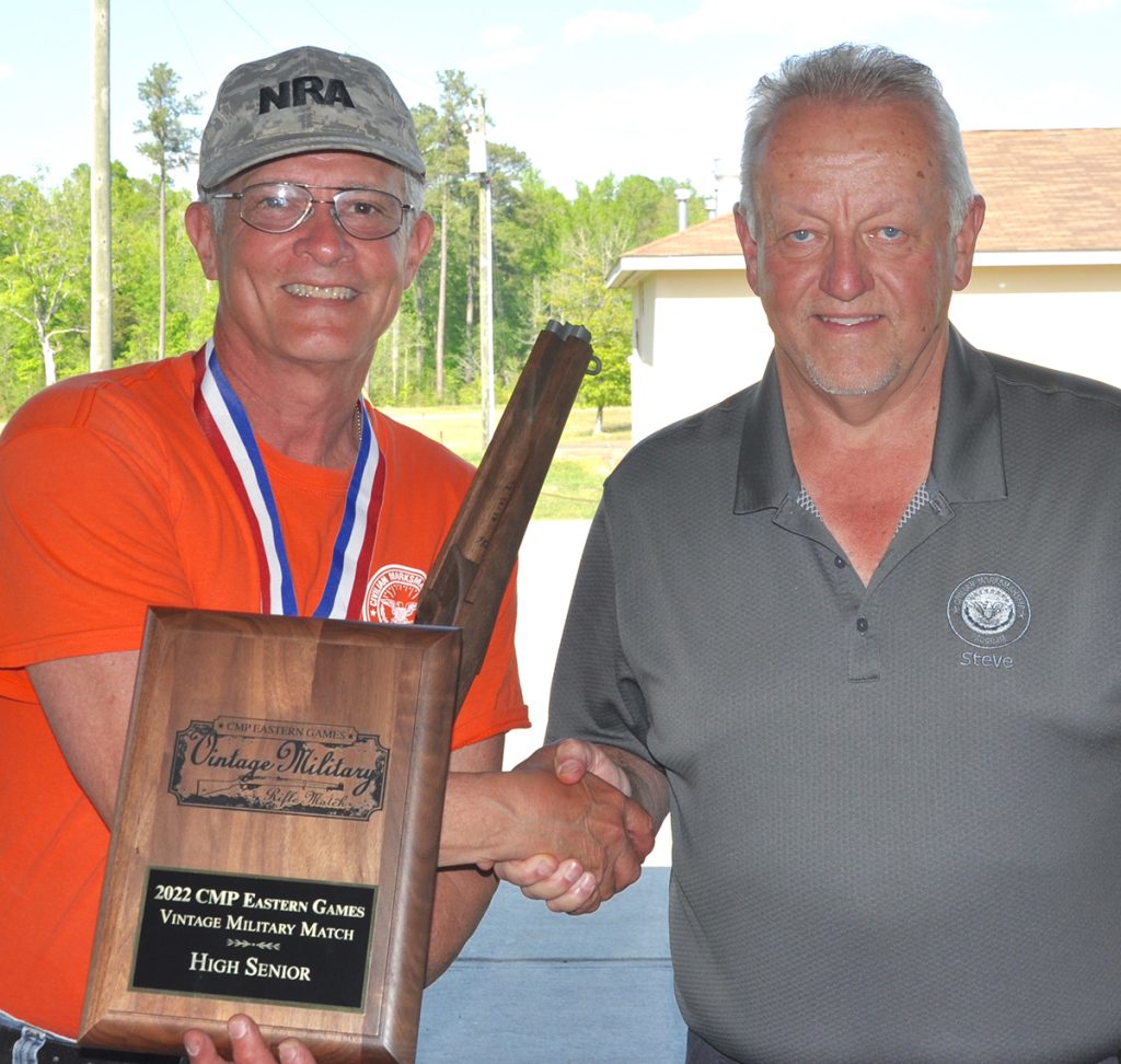 The High Senior of the Vintage Military Match accepts the Award Plaque