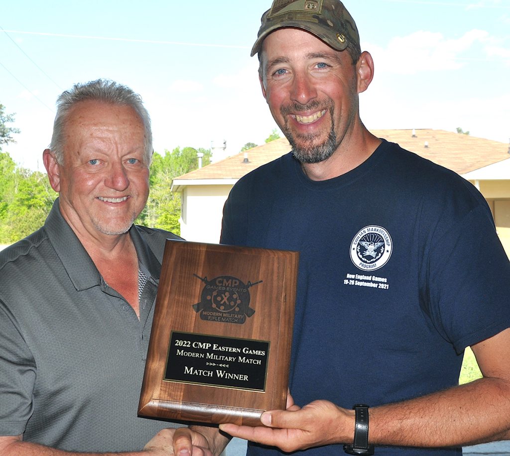 Brian Williams is presented the Modern Military Match Winner Plaque