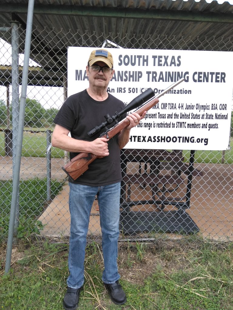 Allen Wood poses with smallbore rifle.