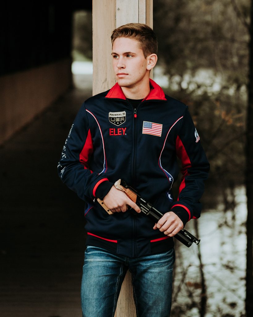 Johnathan poses with his air pistol.