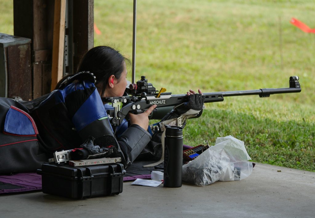 Emme Walrath aims downrange.