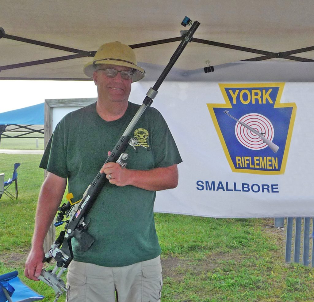 Jeffrey Walter poses with his smallbore rifle.