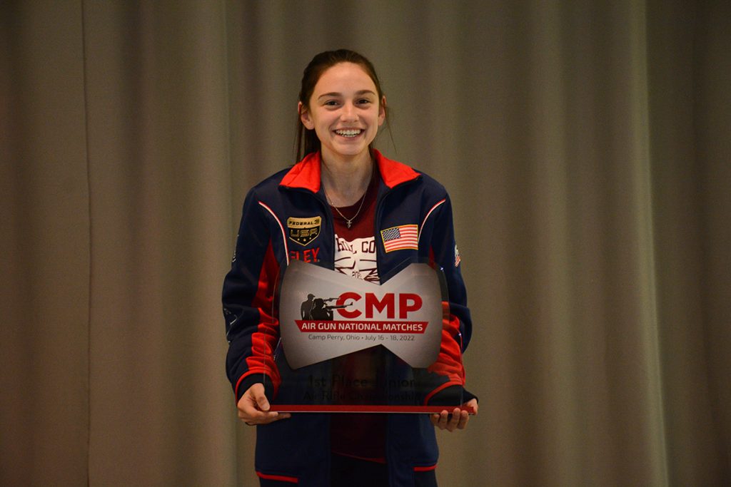 Elizabeth Probst poses with her award plaque