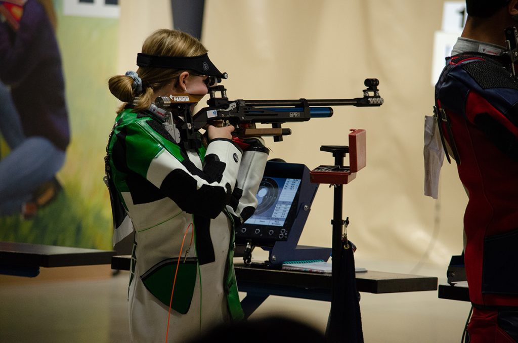 Claudia aiming downrange.