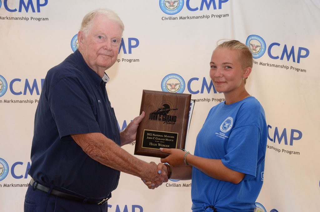 Madelyn Schnelle with award plaque