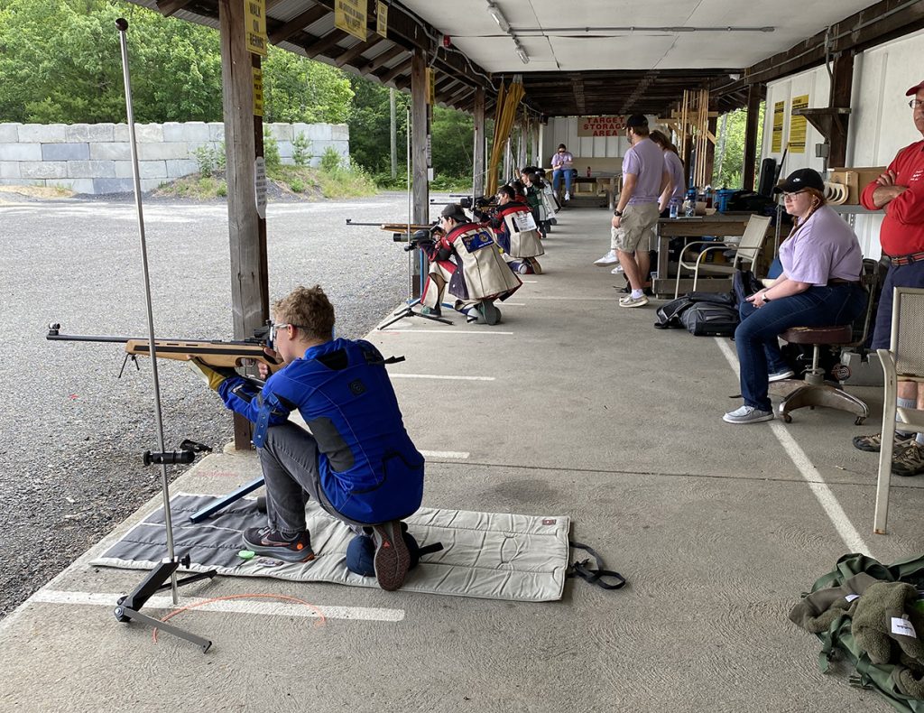 Smallbore camp participants shooting in the kneeling positions