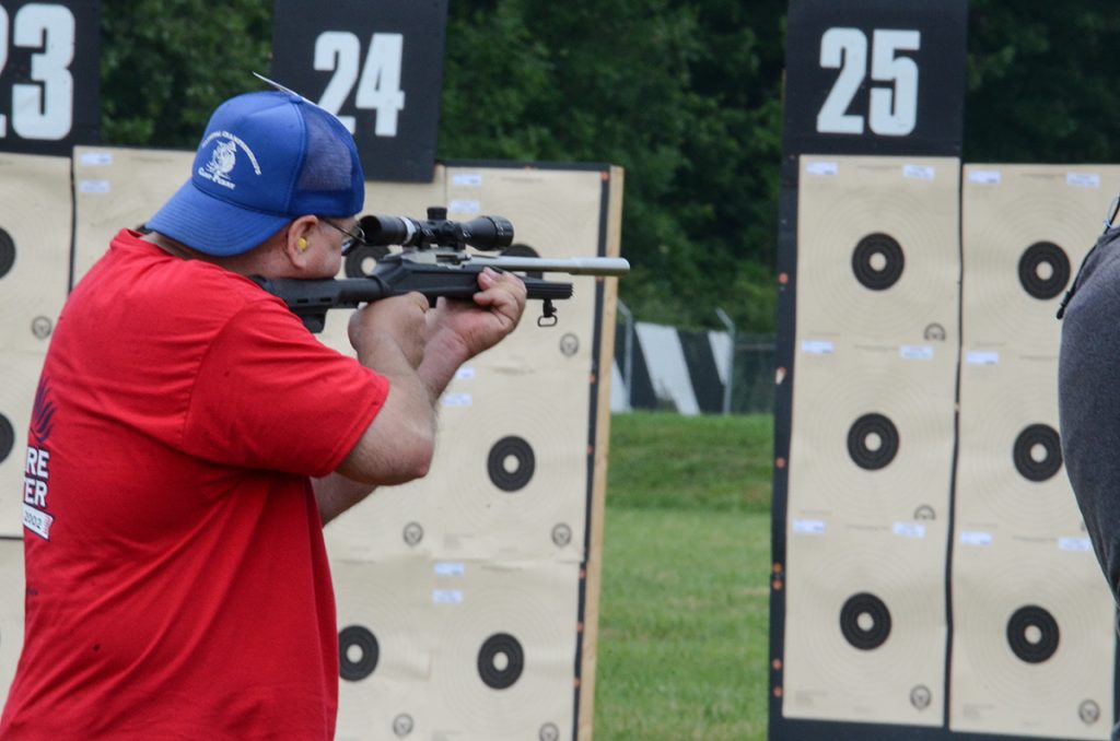 Rex shooting in the standing position during the rimfire sporter match.