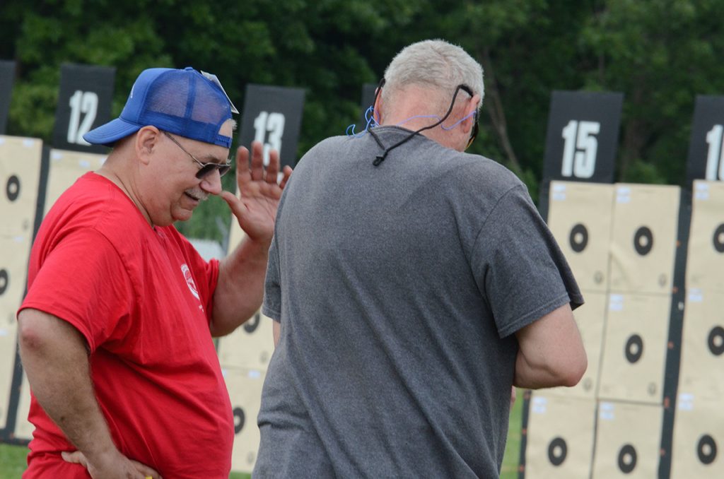 Rex with a fellow competitor during the rimfire event.