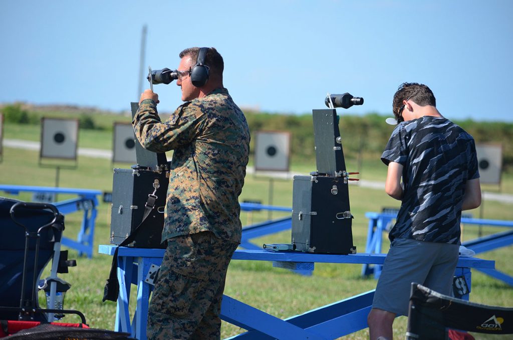 Nick and Caleb standing on the firing line during a National Match competition.