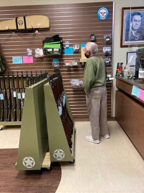 Harry browsing the CMP Store at the CMP Talladega Marksmanship Park.