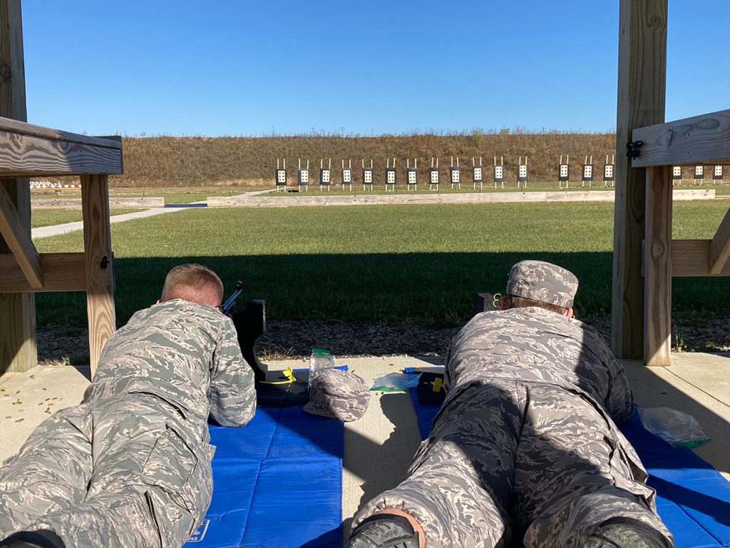 Cadets firing .22 caliber rifles in the prone position