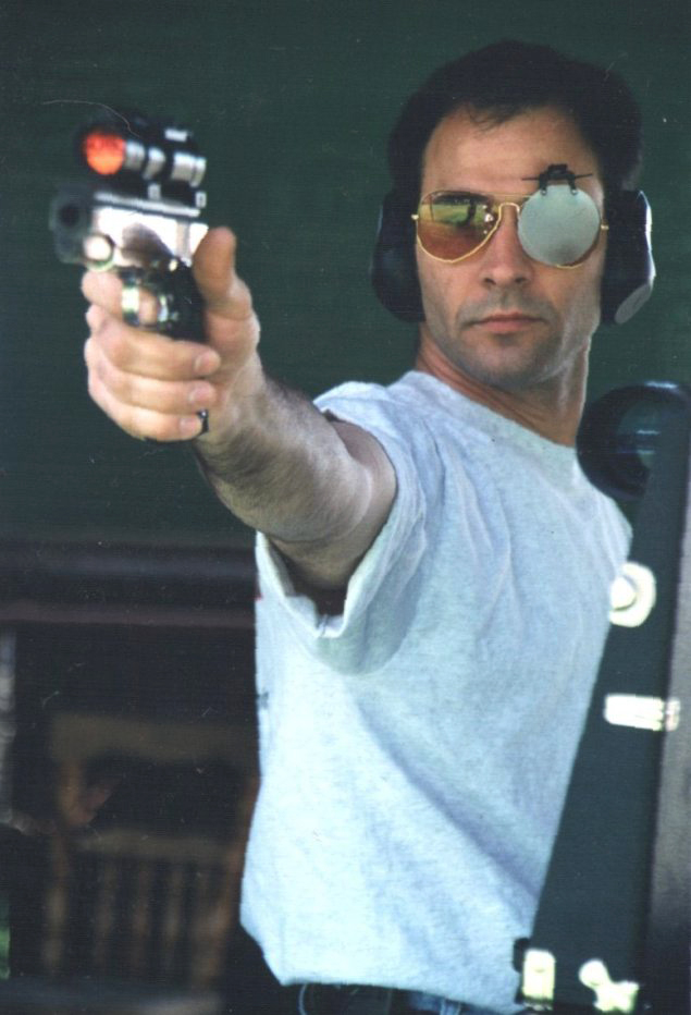 Dave with his pistol in the 1990s.