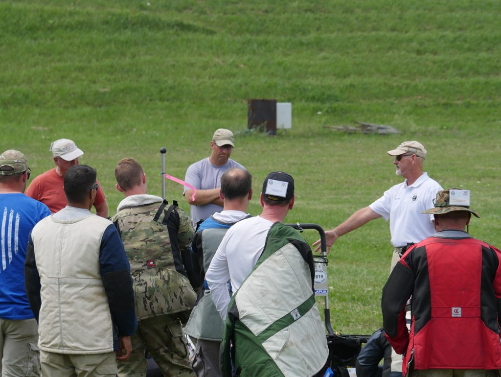 Dan Arnold speaking with a group of clinic participants.