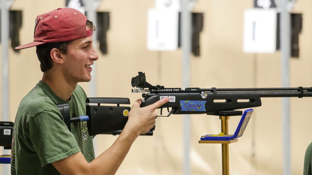 A junior smiles during shots during the Gary Anderson Invitational match.