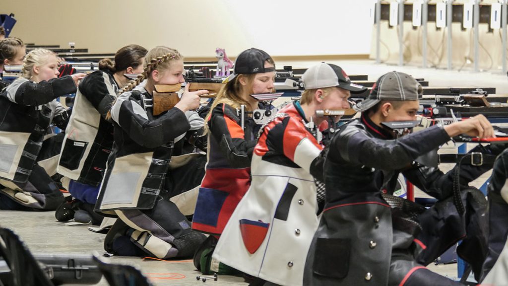 Juniors in the kneeling position during the Gary Anderson Invitational match.