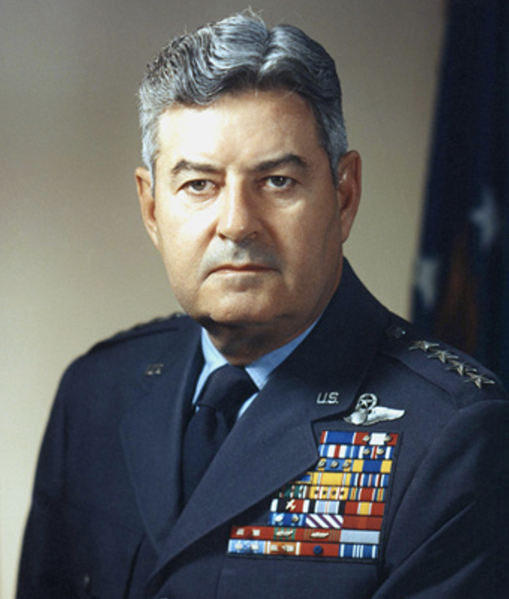A portrait of General Curtis LeMay, in a military uniform.