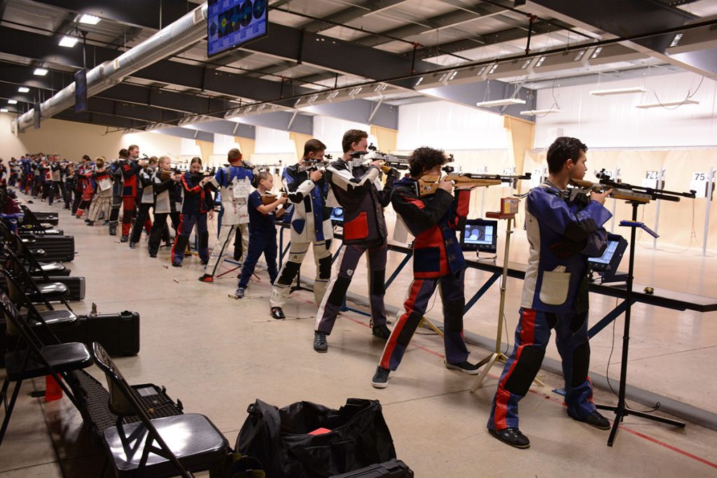 Competitors in an air gun range