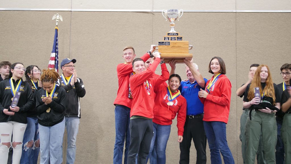 Pascagoula High School with Navy trophy.