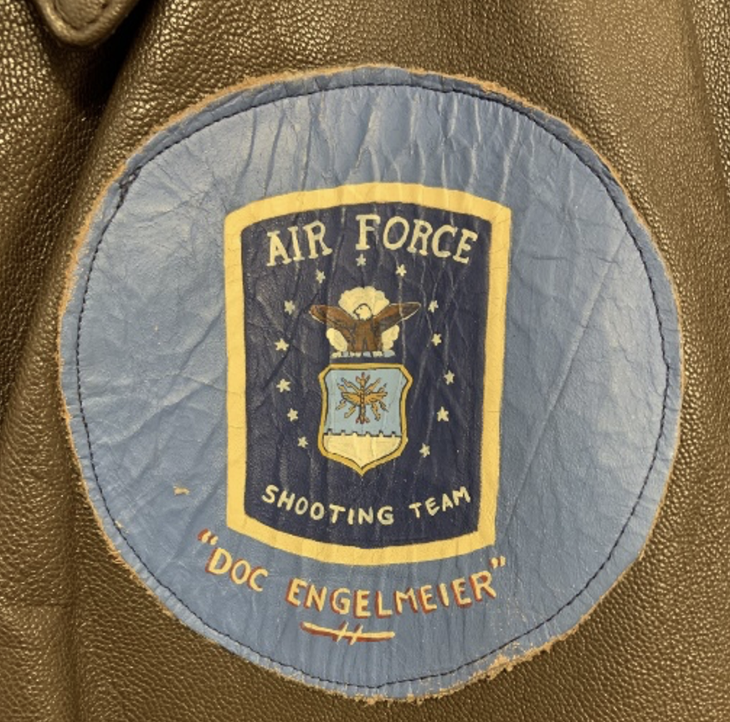 Doc's Air Force Shooting Team patch, featuring the team logo with his name underneath.
