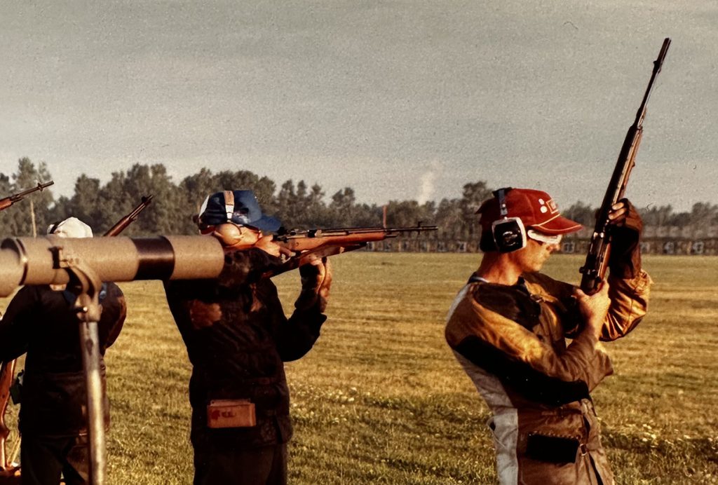 A vintage photo of Pat Smith competing in a rifle match at Camp Perry.