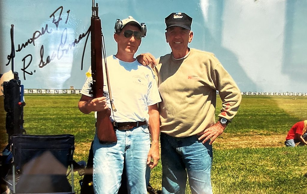 A signed photo of Pat Smith with R. Lee Ermey.