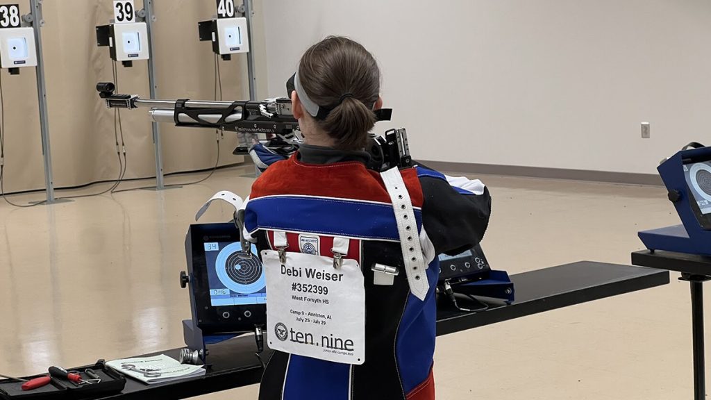 Debi on the range, shooting air rifle in the standing position.