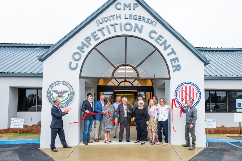 The cutting of the ribbon outside the Judith Legerski Competition Center.