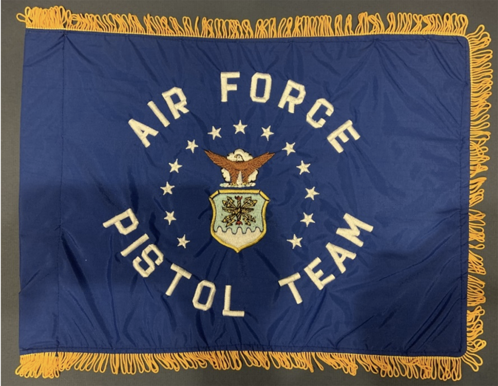 The Air Force National Pistol Team flag featuring the logo.