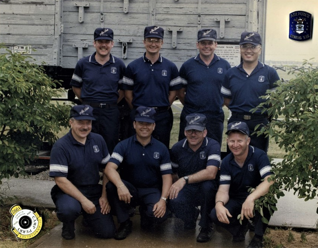 The USAF National Pistol Team posing together outside at Camp Perry.