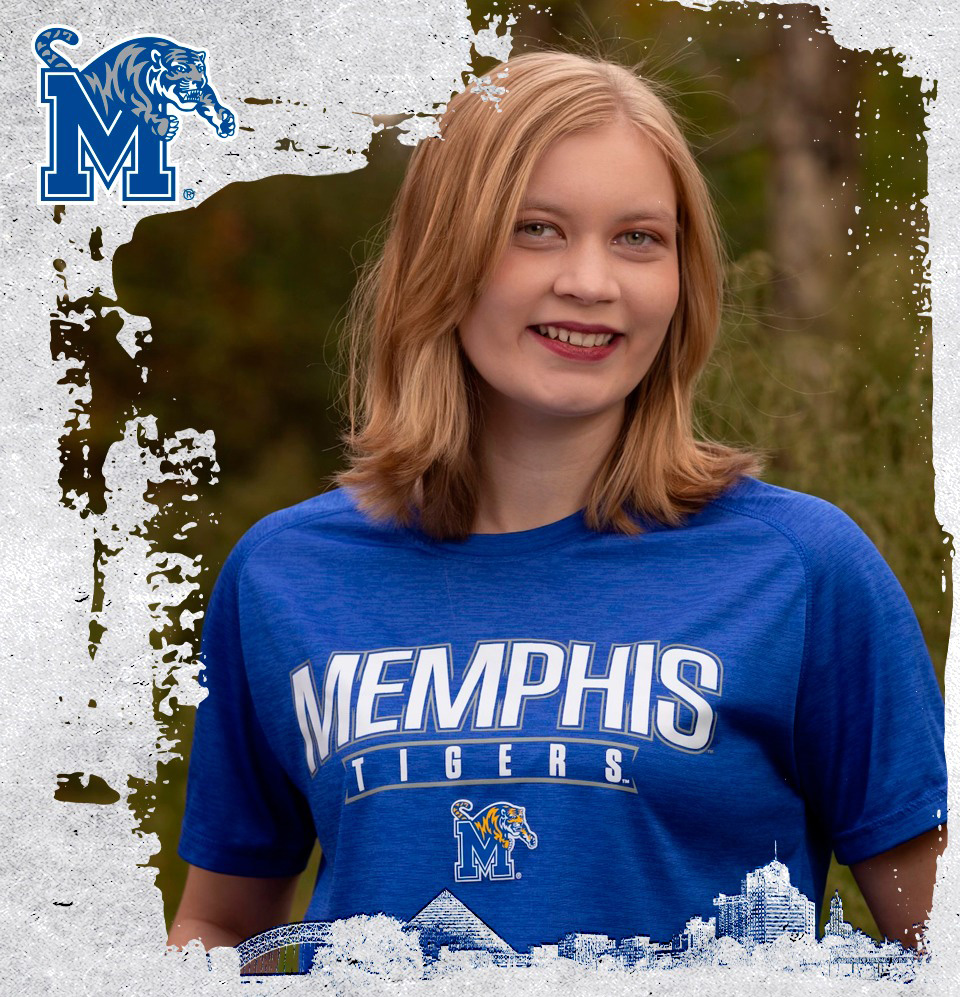 Kenlee smiling with Memphis t-shirt.
