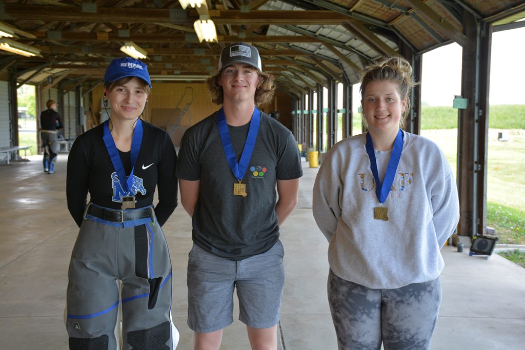 Top three juniors in the smallbore match with their medals.
