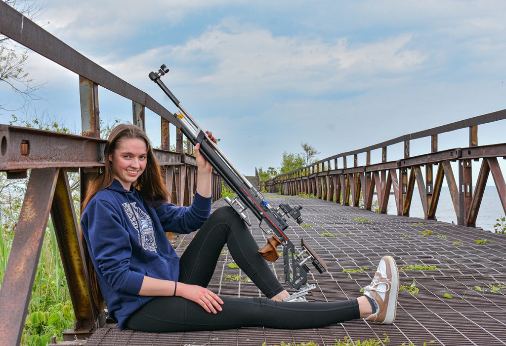 Bremen poses for a photo with her precision air rifle.