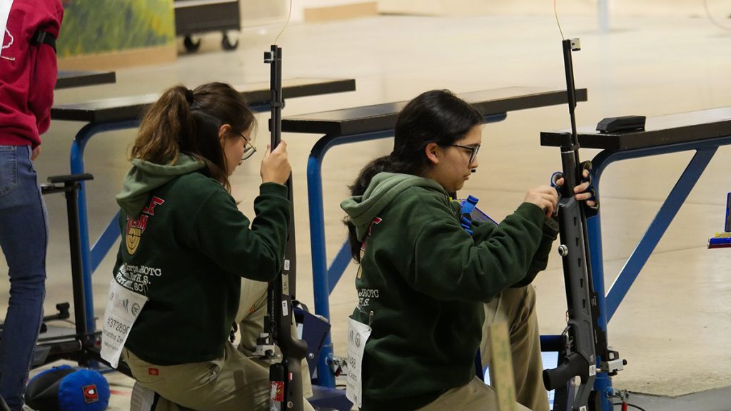 Two Nation Ford HS cadets preparing to fire in the Sporter Air Rifle Final.
