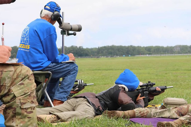 Jim O'Connell coaching juniors on the firing line.