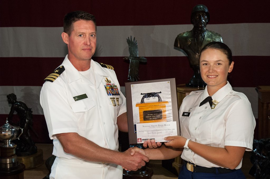 Cadet Emmert with National Women's Pistol Trophy Plaque from 2018.