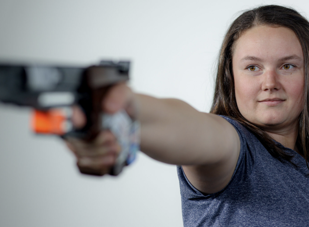 Emmert Traciak poses with pistol