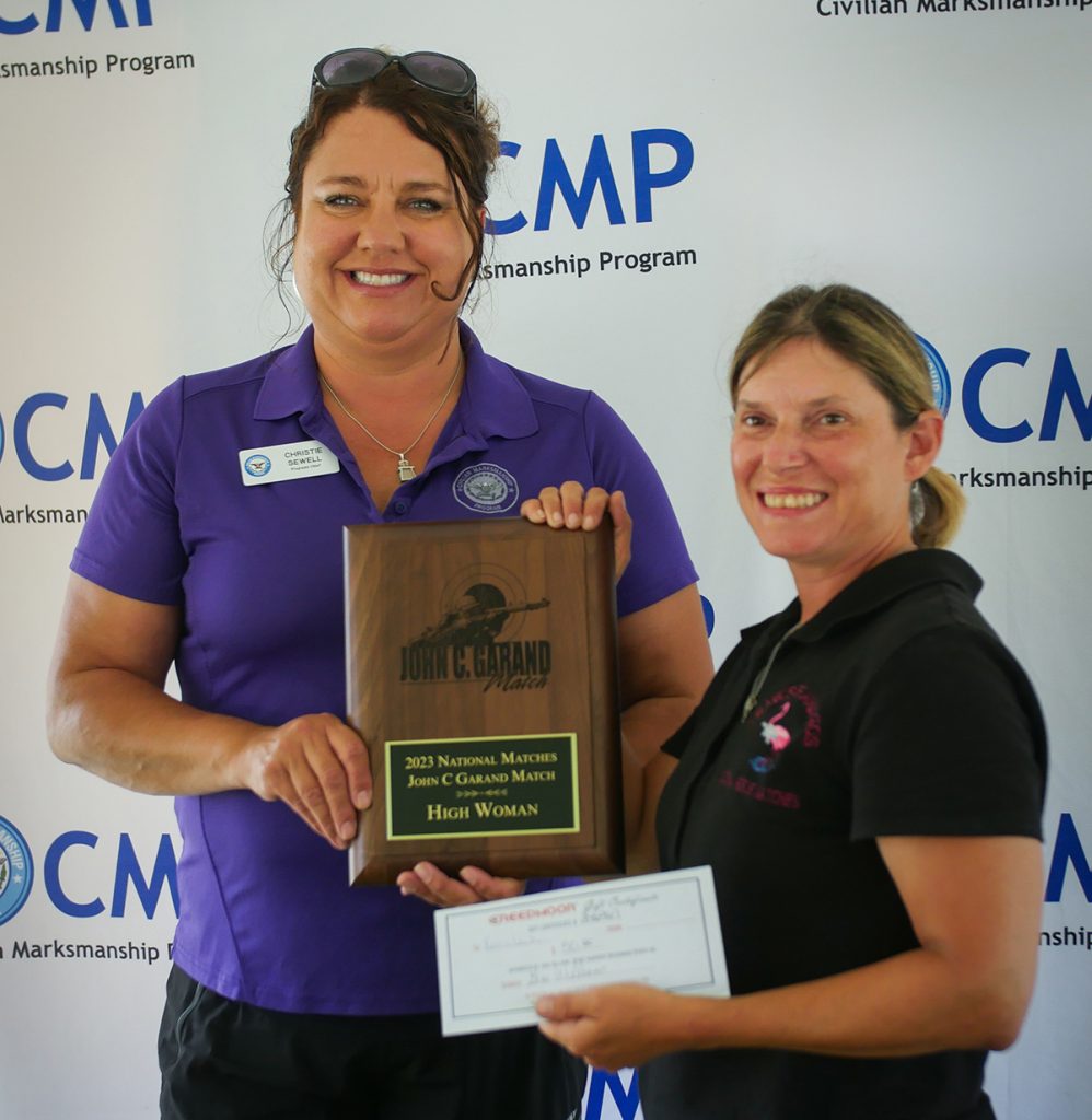 Kerri Lewis with High Woman Garand Match award plaque.