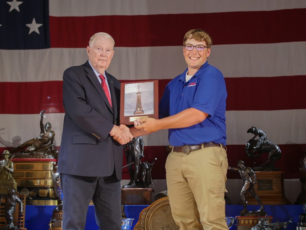 Thomas with Gary Anderson and Alice Bull Trophy award plaque.