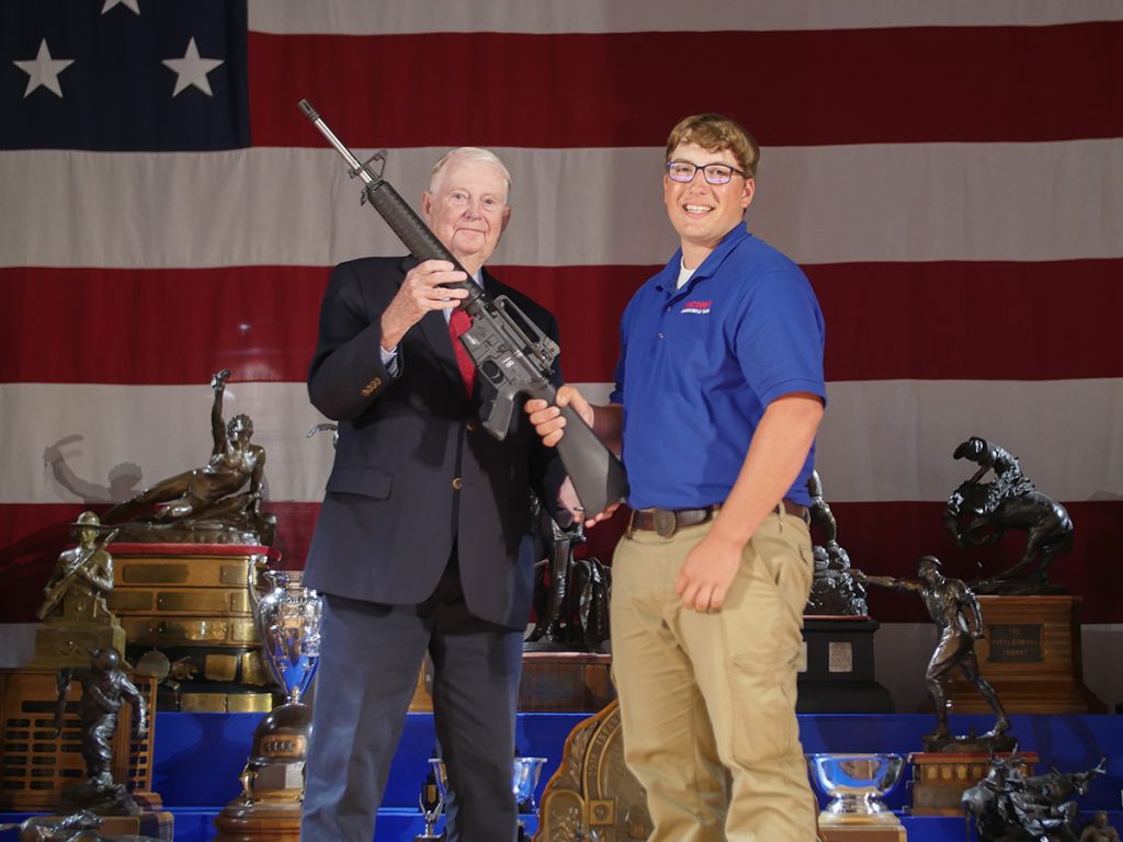 Thomas with Gary Anderson and  award.