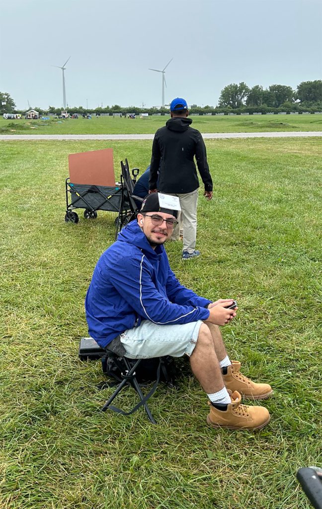 Nick smiles as he awaits his turn on the firing line