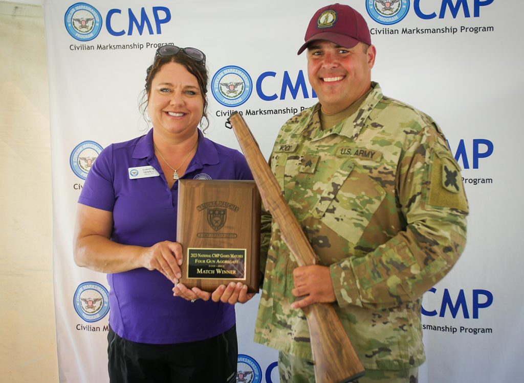 Sgt. Jonathan Wood with 4-gun aggregate award plaque.